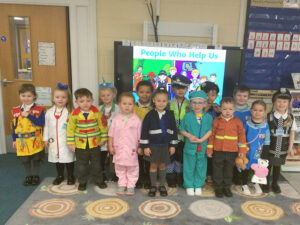 Reception children dressed up as everyday heroes