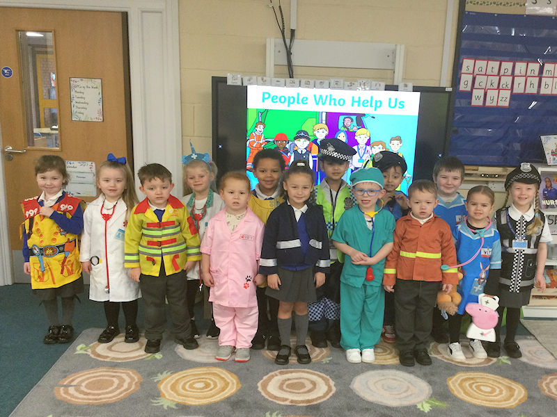 Reception children dressed up as everyday heroes